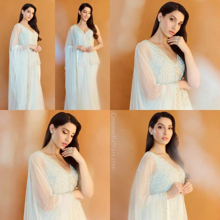 Bollywood Actress Nora Fatehi Gorgeous in White Outfit for Achha Sila Diya song launch