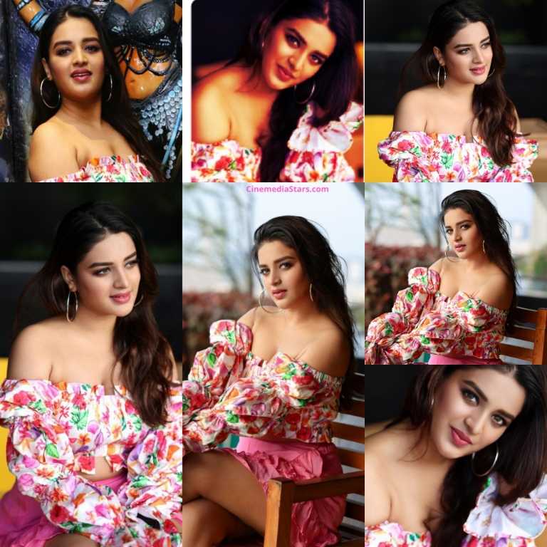 Actress Nidhhi Agerwal Pretty beautiful in Off shoulder Pink Outfit for the Inauguration of Restaurant