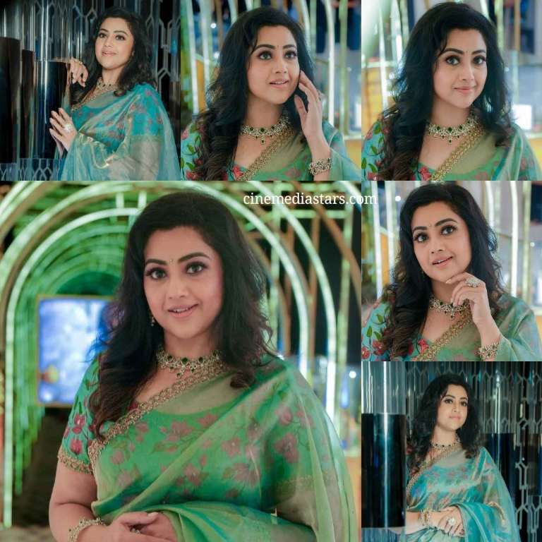 Actress Meena in Pastel Green Floral Saree with blend of tradition and grace